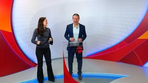 AI Video from prompt: a man in a blue suit jumps up and down with joy,