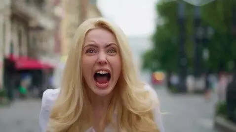 AI Video from prompt: blonde shouting at street
