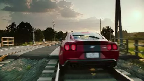 AI Video from prompt: спортивный автомобиль на большой скорости успева