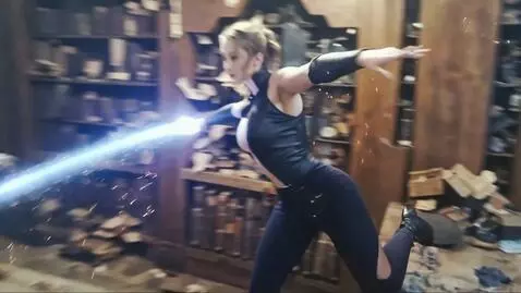 AI Video from prompt: A charming young 25-year-old female magician wit