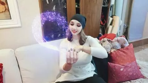 AI Video from prompt: A charming young 25-year-old female magician wit