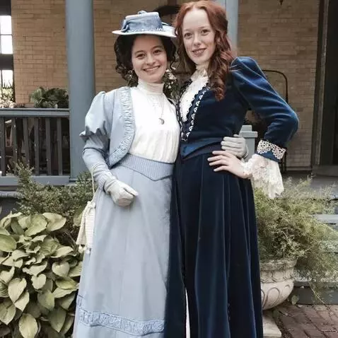 AI Video from prompt: ON BOTH GIRLS PUT ON WHITE SPLIT SWIMSUIT WITH O