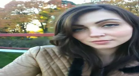 AI Video from prompt: the girl sticks out her tongue, saliva drips dow