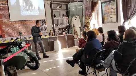 AI Video from prompt: the man standing there has a bandaged arm and he