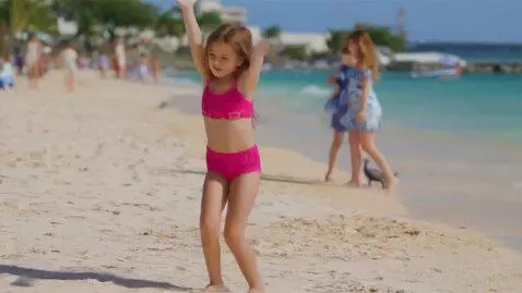 AI Video from prompt: Dancing at the beach Cute girl
