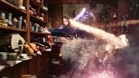 AI Video from prompt: A pretty young 25-year-old female magician is fi