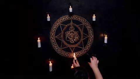 AI Video from prompt: A girl in a short black dress and black hair lig