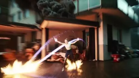 AI Video from prompt: A pretty young 25-year-old female magician is fi