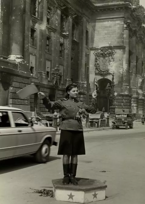 AI Video from prompt: The traffic warden continues to regulate traffic