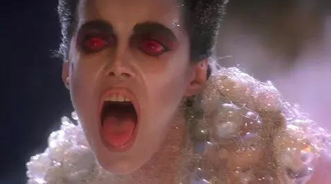 AI Video from prompt: Looking at viewer mouth wide open sticking tongu