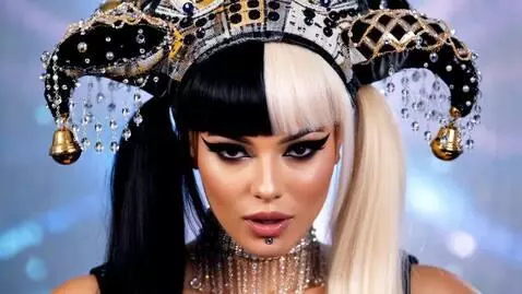 AI Video from prompt: “A stunning young woman with a perfectly symmetr