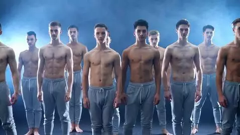 AI Video from prompt: **“A formation of shirtless male dancers stands 