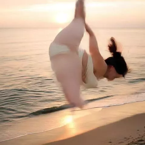 AI Video from prompt: take a running start, do a somersault using your