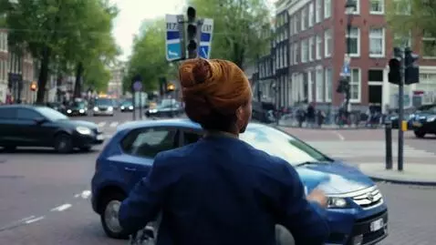 AI Video from prompt: Show this guy washing windshields with a squeege