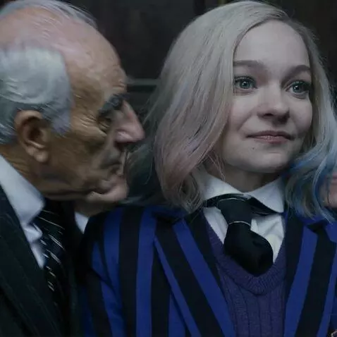 AI Video from prompt: Old man kissing Enid Sinclair