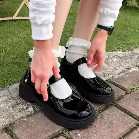 AI Video from prompt: She takes off her shoes she walking barefoot