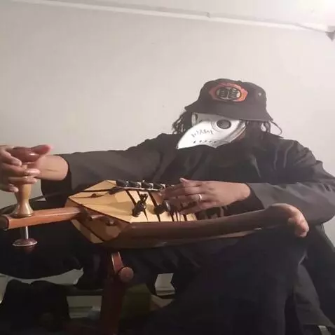 AI Video from prompt: The character pulls the hurdy-gurdy sideways in 