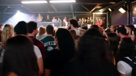 AI Video from prompt: People going crazy listening to heavy metal musi