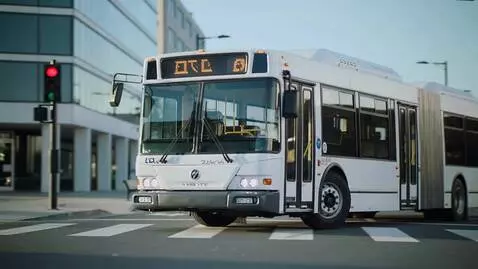 AI Video from prompt: Electrobus crossing street