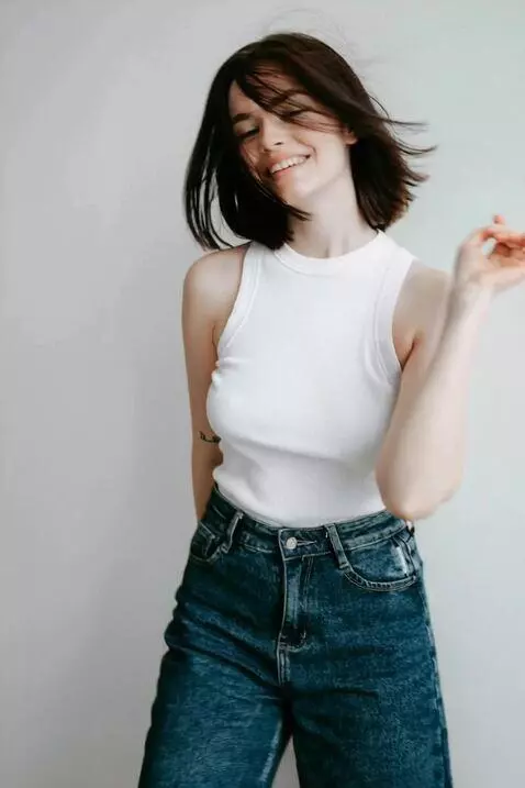 AI Video from prompt: Studio-style photography. A girl dances a rhythm