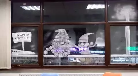 AI Video from prompt: Animate the image by having the small Gonk climb