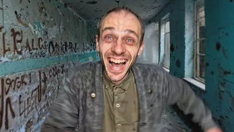 AI Video from prompt: A madman runs forward along the corridor in an o