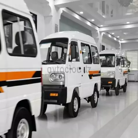 AI Video from prompt: A group of around ten tuned Damas vans are lined