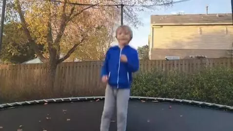 AI Video from prompt: A boy is jumping on a trampoline