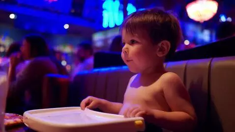 AI Video from prompt: Shirtless Four-year-old toddler boy looking brig