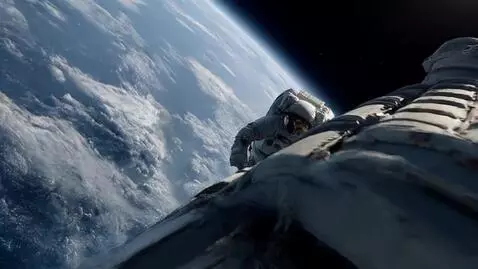 AI Video from prompt: Cinematic wide shot of an astronaut climbing up 