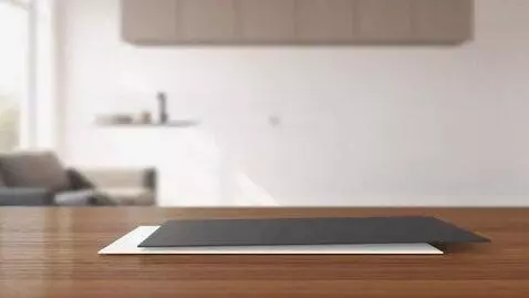 AI Video from prompt: Main Scene: A modern, minimalist living room wit