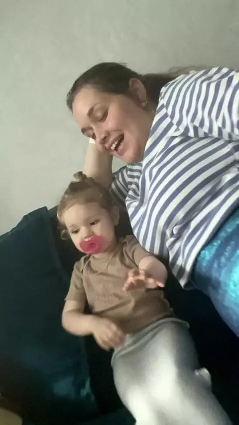 AI Video from prompt: A mother and child mermaid duo explore a kelp fo