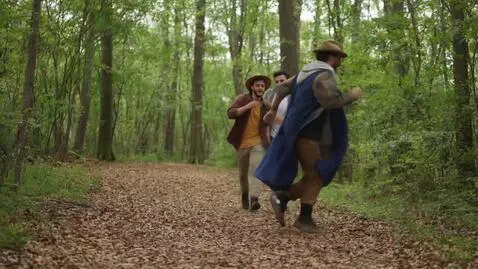 AI Video from prompt: двое мужчин бегут по лесу. Один впереди, другой 