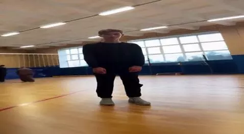 AI Video from prompt: A realistic photo of a young man on a white back