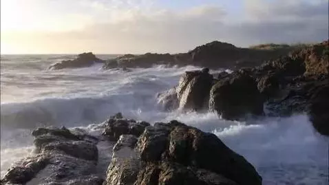 AI Video from prompt: waves crash against the rocks