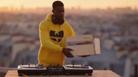 AI Video from prompt: Wide shot opening on Paris rooftops at golden ho