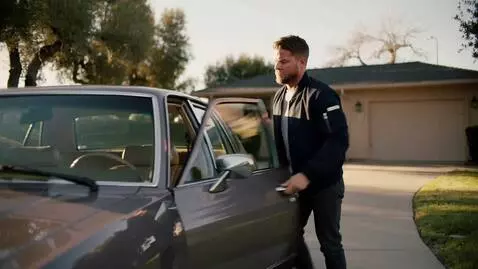 AI Video from prompt: He gets in the car and drives away.