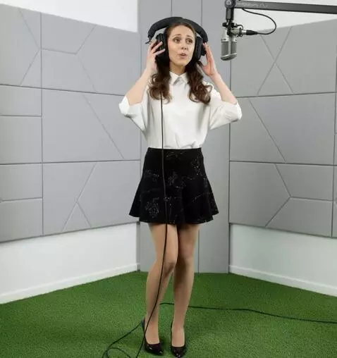 AI Video from prompt: A woman with headphones is singing. He presses t