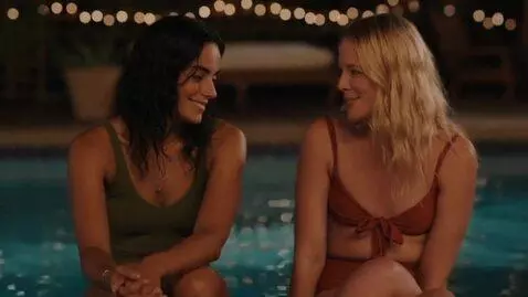 AI Video from prompt: 2 beautiful women in  swimsuits discussing their