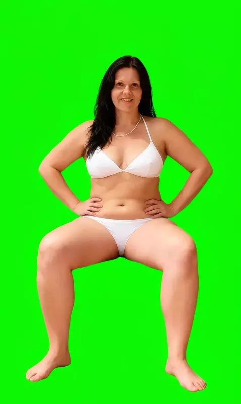 AI Video from prompt: She rocks her abs lying on her back, shooting fr