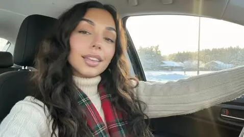 AI Video from prompt: Laura Love is flirting with the camera from the 