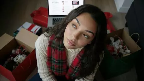 AI Video from prompt: Laura Love is filmed from the aerial view and sh