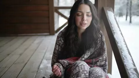 AI Video from prompt: Laura Love is being filmed on her front porch wr