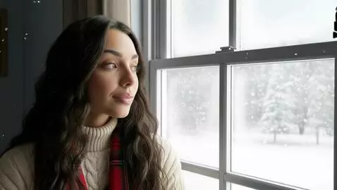 AI Video from prompt: Laura Love is seen looking outside of the window