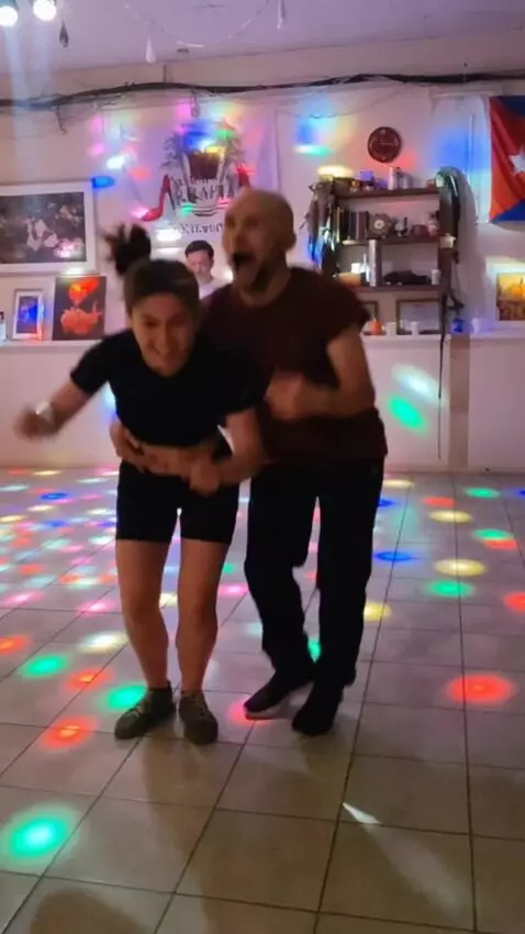 AI Video from prompt: transform a man into a gorilla, jumping for joy 