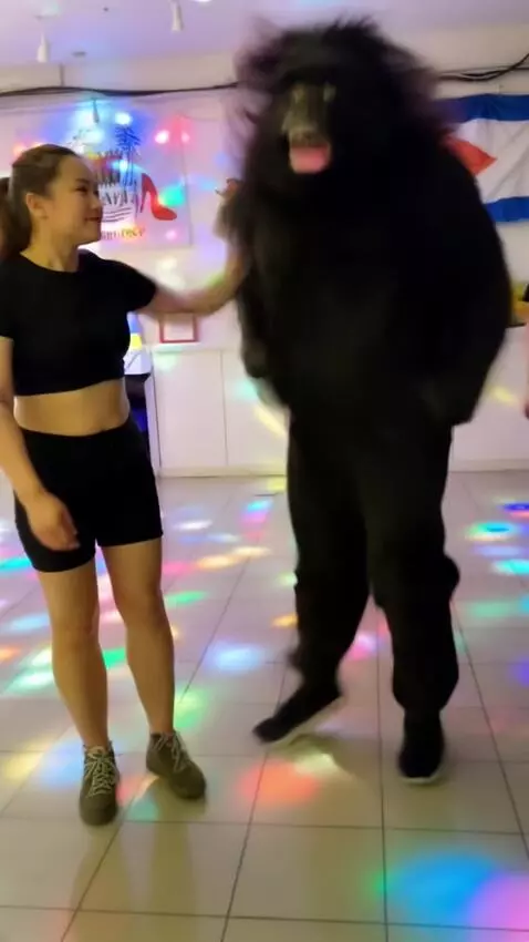 AI Video from prompt: Turn a man into a wild hairy gorilla monkey, jum