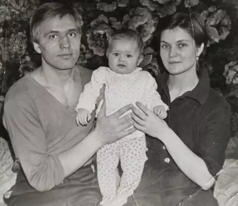 AI Video from prompt: A man and a woman are holding a child in their a