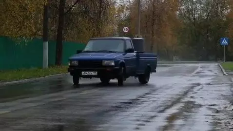 AI Video from prompt: Cloudy weather, trees, green fence, grass, and r