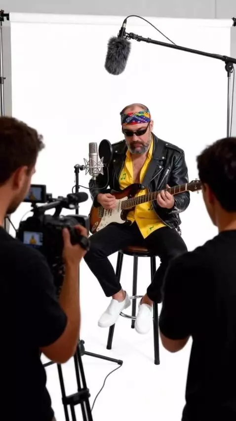 AI Video from prompt: A man plays a blues guitar solo.