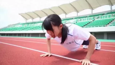 AI Video from prompt: An 18-year-old Japanese girl doing push-ups in a